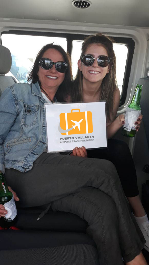 Mom and daughter enjoying a dring together while being transported
